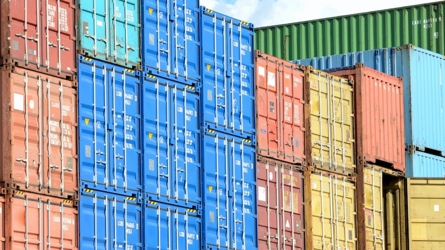 Shipping container doors with a central lock box